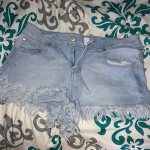 Distressed denim shorts